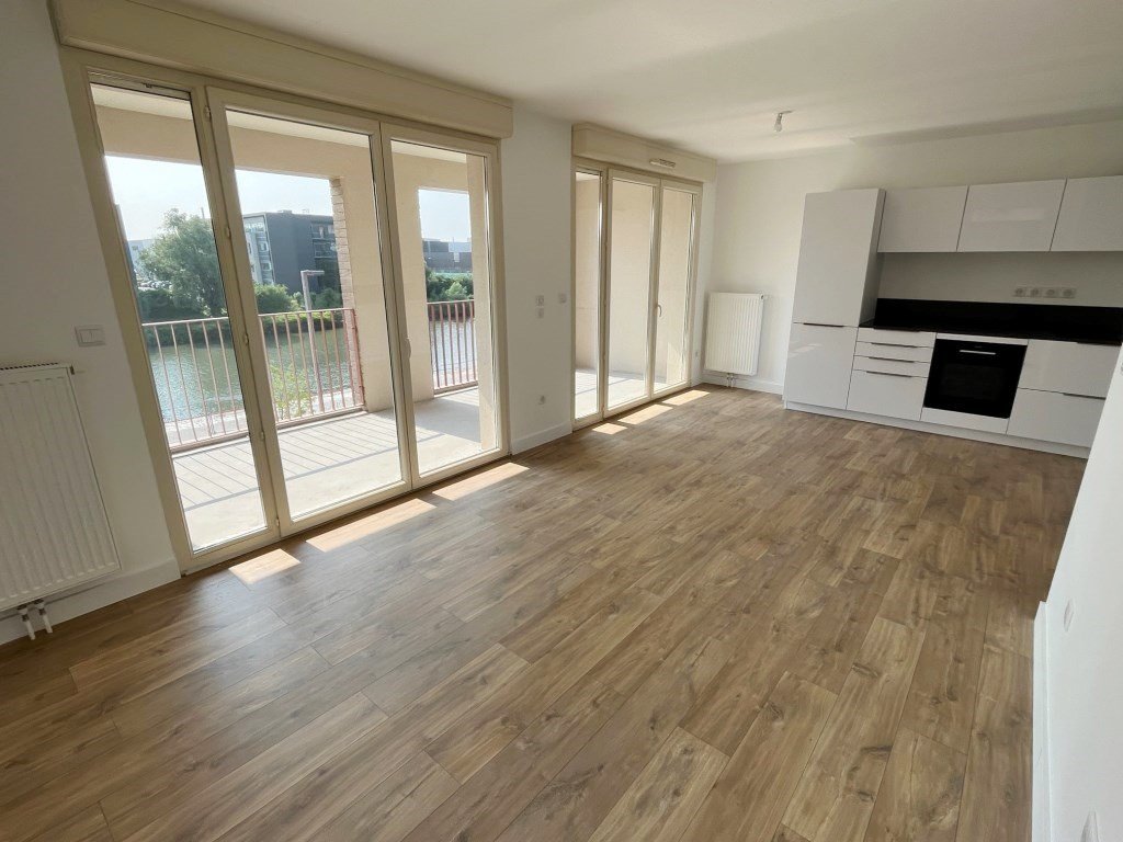 F3 AVEC PARKING ET GRAND BALCON A LOUER - ST ANDRE LEZ LILLE - 65.5 m2 - 959 &euro; charges comprises par mois